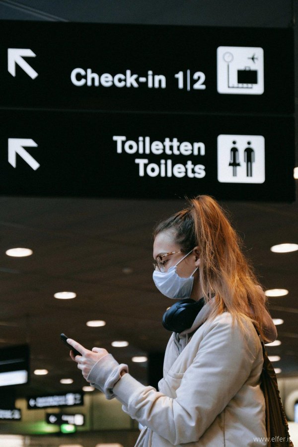 woman-with-a-face-mask-texting-3943880